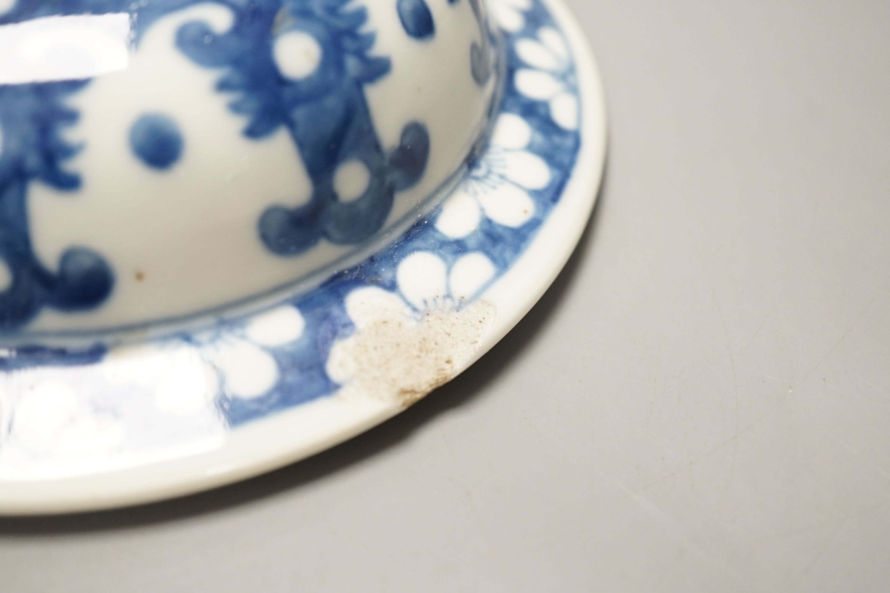 An 18th century Chinese export teabowl, a Chinese blue and white vase cover, similar teabowl and past box and cover.